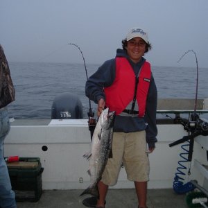 Casey and his first salmon. This photo appeared in the "Kid's Gallery" of Saltwater Sport Fishing Magazine
