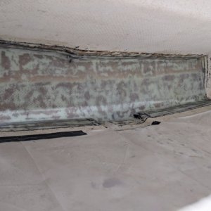 Didn\'t check the thickness of the existing glass until after I ground it down and felt that it wasn\'t just one or two layers of mat.  It was already 3/16+, but because I already ground it and had 2 layers of 1208, 1 of mat and the PeelPly cut, I went ahead and applied...