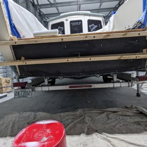 all excess epoxy paste that squeezed out along the perimeter was thoroughly removed and cleaned off to be added just before the transom outer glass face was reapplied.