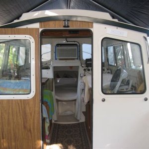 (007 7) AC stores in plastic container under V Berth