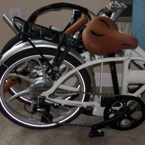 Media 'I am assuming that I won't need a dinghy because my boat is the size of a dinghy.  What might be nice is a grocery getter on shore.  This is a folding bike, not unusual for a boat.  What is unusual is that it is electric.  20 mph and a 30 mile range.  48# including battery.' in album 'I am assuming that I won't need a dinghy because my boat is the size of a dinghy.  What might be nice is a grocery getter on shore.  This is a folding bike, not unusual for a boat.  What is unusual is that it is electric.  20 mph and a 30 mile range.  48# including battery.'