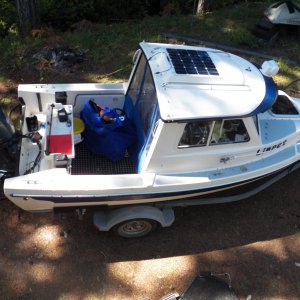 Media 'This is how it fits in the cockpit of a CD 16.' in album 'I am assuming that I won't need a dinghy because my boat is the size of a dinghy.  What might be nice is a grocery getter on shore.  This is a folding bike, not unusual for a boat.  What is unusual is that it is electric.  20 mph and a 30 mile range.  48# including battery.'