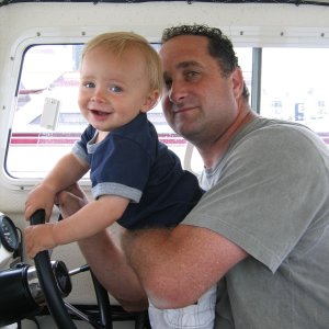 Logan at the helm