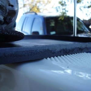 #5 modifying the West Marine aft battery holder 1/4 inch taken from rear lip