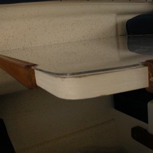 Table top aft edge cover layover