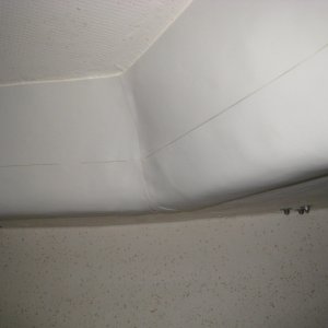 1/8th inch thick adhesive foam tape applied to overhead in v-berth