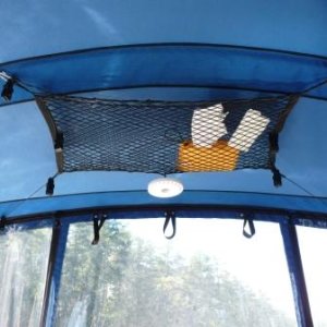 10. The "bag" net and black locking clips work well for drying stuff. The white portable LED light shines over the cooler at night.