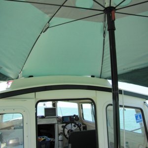 Attach with ball end bungee to hand rail.