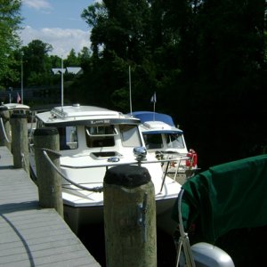 Lady KC and Litl Tug rafted at Dismal Swamp welcome center