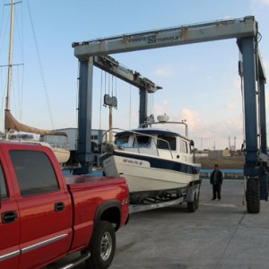 Media 'Here comes the travel lift' in album 'In the boatyard, early'