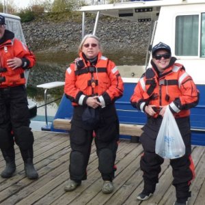 Boat crewmembers chatting dock side