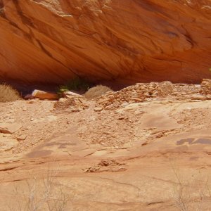 About a mile up the canyon, there are unrestored ruins high up on the canyon walls.