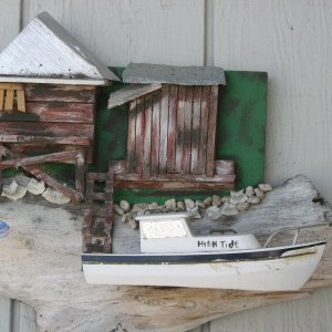 Media '6/29/2012  A carved model of my old 22' CD.
Carved in Beaufort, SC. My brother sent it for my birthday several yrs. ago.
Boat is about 14" long.' in album 'High Tide; 
1983 22' Angler(Classic)'