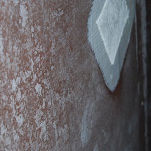 Fiberglass patch on backside of through hole
