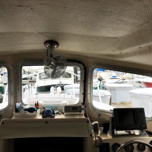 Removed over head shelf, relocated VHF, and added fan