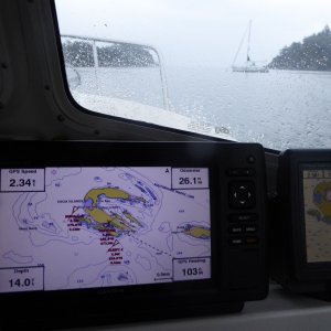 Heading out early Sunday Morning. Winds have died, but now replaced with rain. Hey who is that Sleepy C on the plotter?