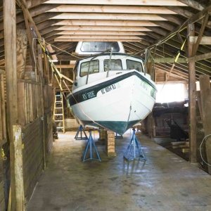 Trailer removed and jack stands in high position with initial blocking under keel