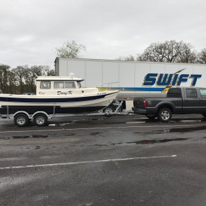 towing from Oregon to the barge in Tacom for trip to Anchorage