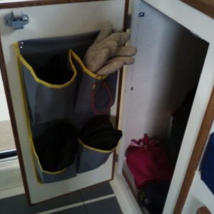 pockets and internal drawer added to rear cabinet across from head