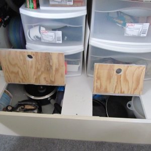 Added floor with hatches for cookware storage