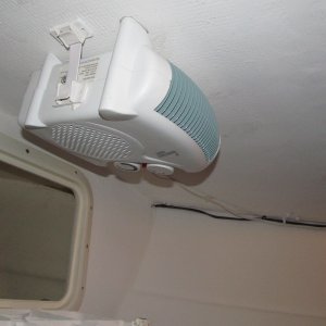 Media 'Ceiling heater second view.  Its a table top model and I hung it with 5200 and RV appliance straps.  Solid for 1.5 years now.' in album 'Vlock used to quick-mount emergency motor (carried for dinghy anyway)

More steerage abilily than travel ability and would at least provide some control while waiting on help.'
