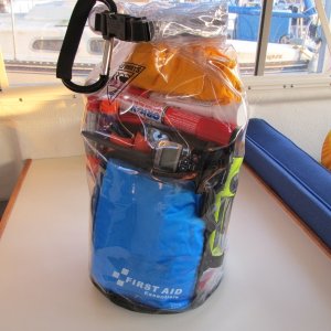 fully stocked ditch bag lives at my feet at the helm
