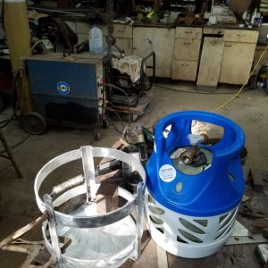 Welding up an aluminum BBQ propane tank holder.
