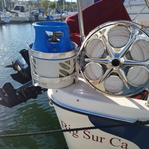 The BBQ propane set up along with the Quickline stern anchor reel which is very compact. 5,000# nylon strap.