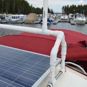 Media 'The center bar between the 2 uprights is one within another, adding strength as well as allowing the outside one to roll freely as the kayak is moved into place.' in album 'The rack is desined to keep the kayak parallel to the boat.  By doing so the stern does not wear on the bimini, nor does the kayak act like a parachute and catch the wind.'