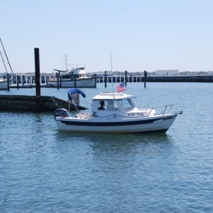 Litl' Tug departing Willoughby Harbor.  Taken by Art of Sea Angel.