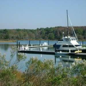 boat envy?  Not me.  If you look real hard, Litl' Tug can be seen behing the big guy where the dock turns.