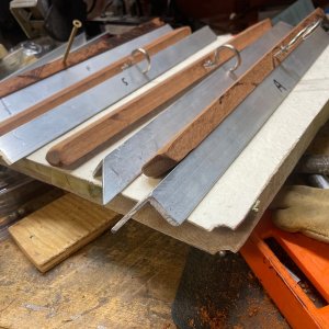 Cherry inserts with 1/8” aluminum angle trim