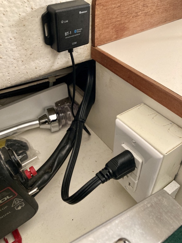 014 there's an outlet right by the throttle so I can just plug it in when using shore power (keep it simple sailor)