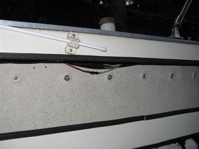 019 19
Starboard Cockpit storage with new bolts and washers.
