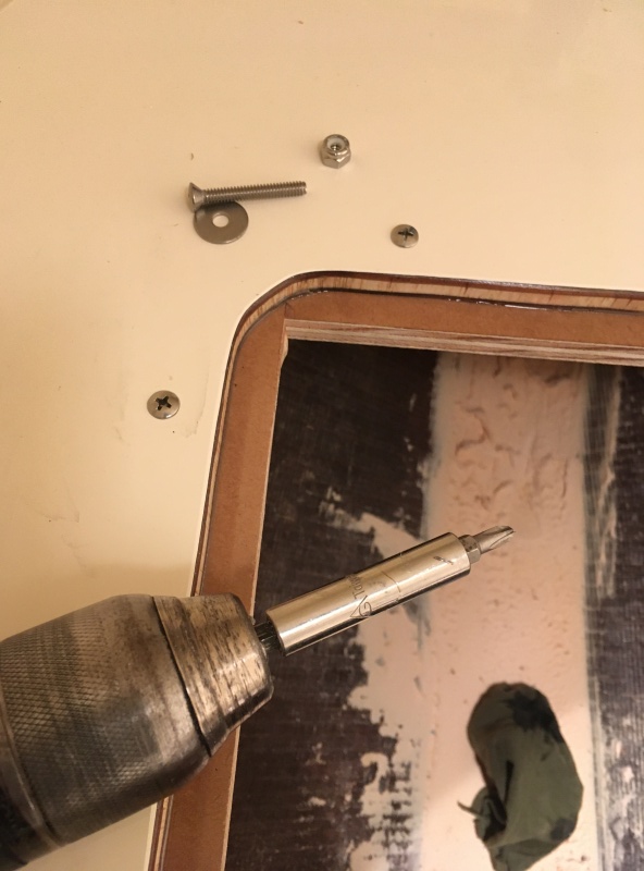 028 I used oval head counter sink SS bolts, washers and nylock nuts to snug everything up