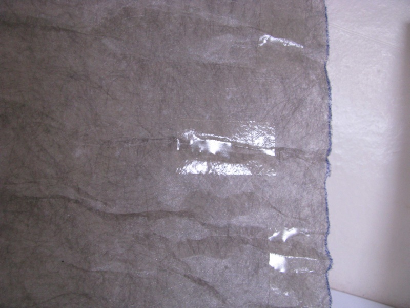03 Contact Stik glue sheets are very thin and transparent.  It adheres very well to the surface.