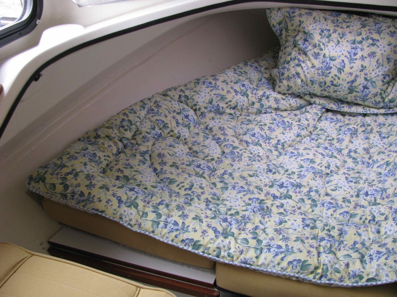 07 Our comforter in place, which does not prevent air from circulating through the HyperVent along the sides of the hull so long as the comforter does not touch the hull wall. 9/26/12 update:  we ditched the comforter early in the season and continue to use our old configuration as described in our folder "Marinaut 215 Berth Set Up for the "Betty Ann"" We are also pleased to report that we have had no issues with condensation at all this year since installing the Hypervent.