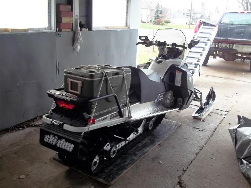 12/3/2015   My fish cooler fits okay . Sled is now at the dealers having the mirrors removed and getting a better travel cover put on and also picking up a storage cover.