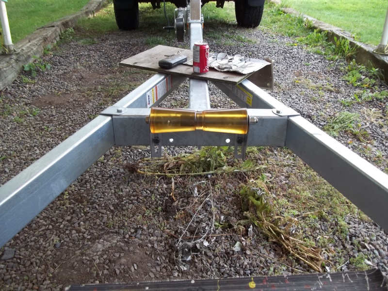 14/09/2011..went to the dealers and picked up my trailer and installed a 12 inch keel roller.( one that i had at home )..dealer was going to install a smaller one.( which he had ordered and i was expected to pay for ). to fit the existing holes because he said drilling new holes would cause the trailer to rust.