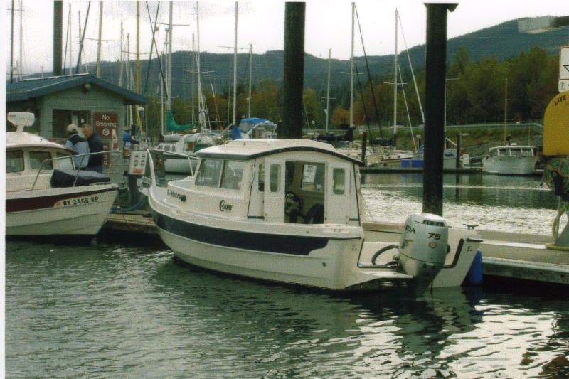 2 Oct 2005 Sequim: Two Lucky Fish & R-Matey at the John Wayne Marina fuel dock.