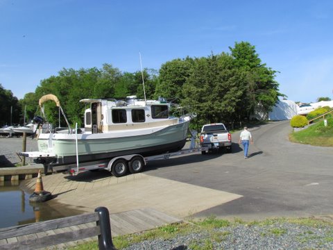 27'Ranger towed by a 2011 Chevy one ton pickup with a Duramax diesel owner says it pulls it like there is nothing there. Hull weight 6500 pounds. Nice new Float On trailer. This guy knows how to live.