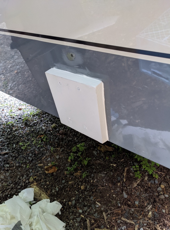 3/4\" Starboard mount for new transducer. Screws go into epoxy blobs in transom