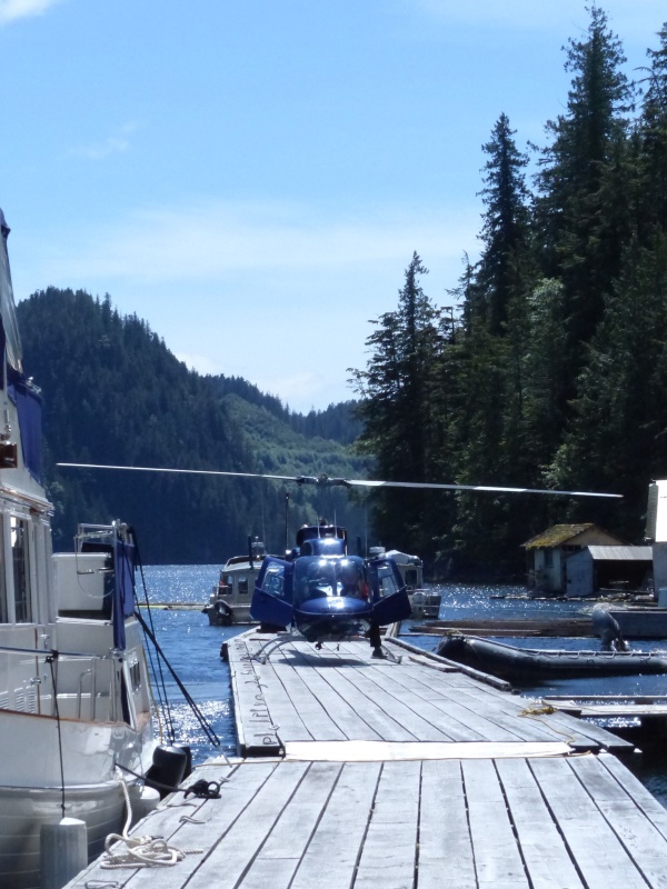 30 Helicopter landing on the dock making a beer run for the loggers
