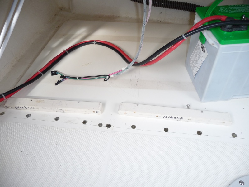 4. Starboard side ready to reinstall hardware. 
There was some air bubbles, shrinkage or seapage of the epoxy into the foam core, so it took two applications of epoxy.
