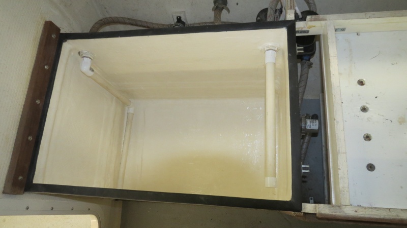 50 gal. live well/ice fish box. Pumps fill and drain the box.