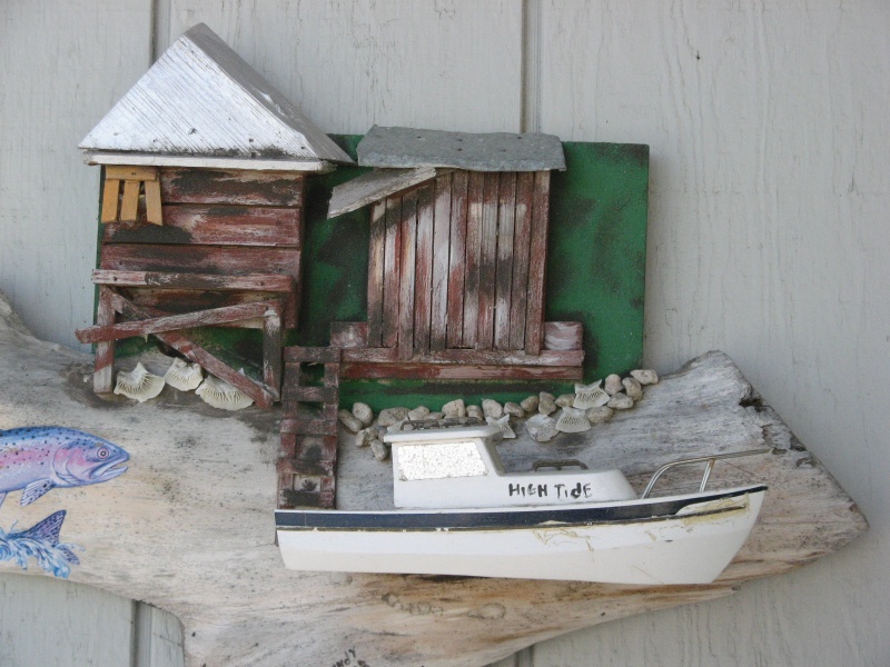 6/29/2012  A carved model of my old 22' CD.
Carved in Beaufort, SC. My brother sent it for my birthday several yrs. ago.
Boat is about 14" long.