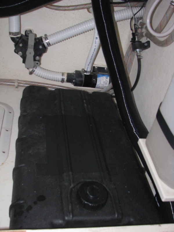 6 gallon fuel tank, 3-1/2 inches high, 30 inches" long, fuel pump is on wall to the right