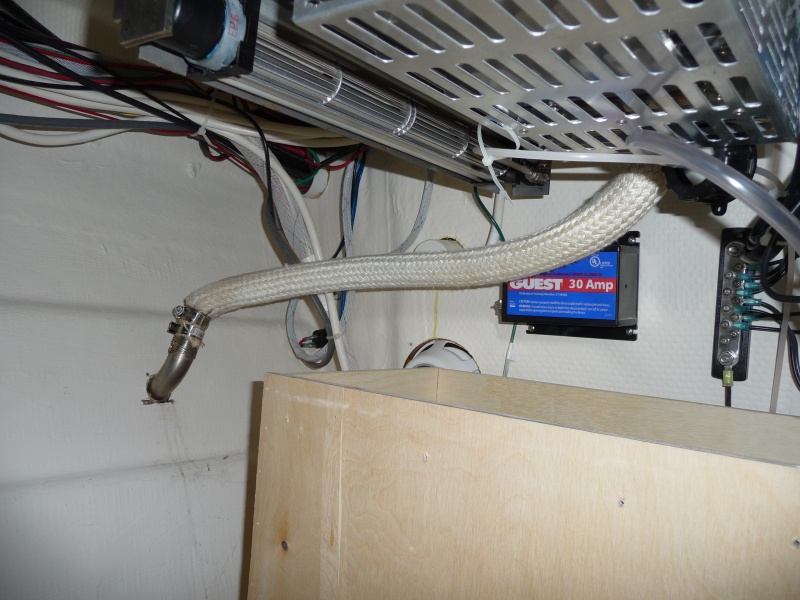 6. The original exhaust connection leaked an intolerable amount of water into the bildge and kept getting everything stored under the sink wet all the time.