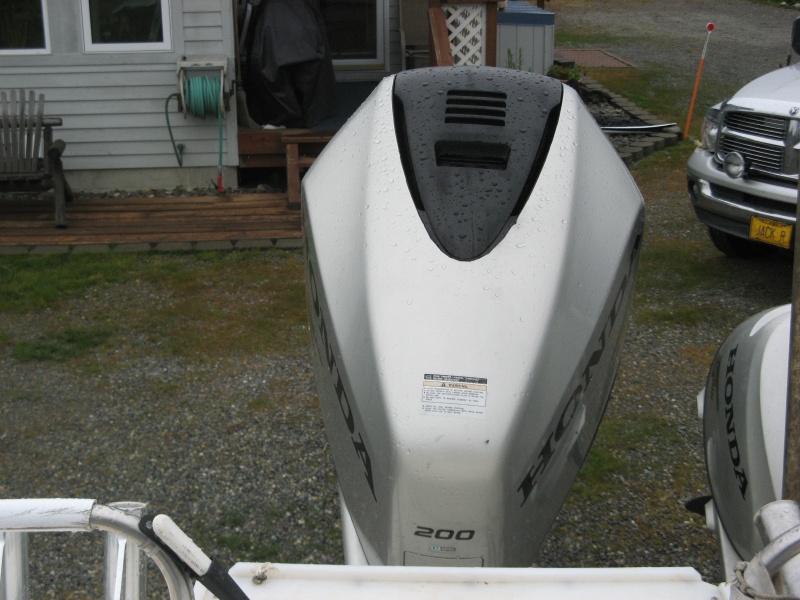 7/22/12 Painted cowling to repair the peeling gray paint.  Used black "rattle can" bedliner spray; 3 coats.