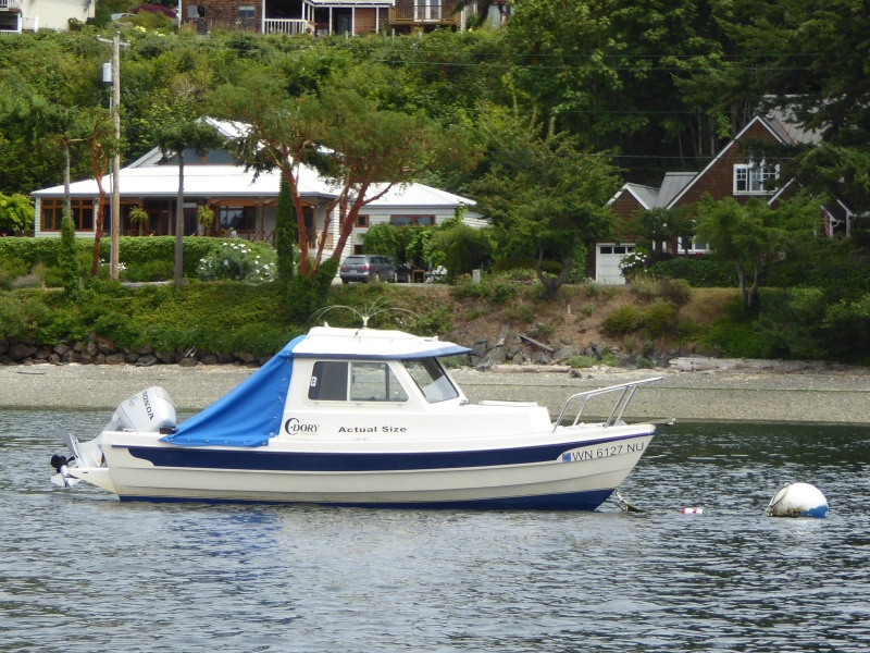 A 16' Cruiser named "Actual Size" moored off of Bainbridge Island